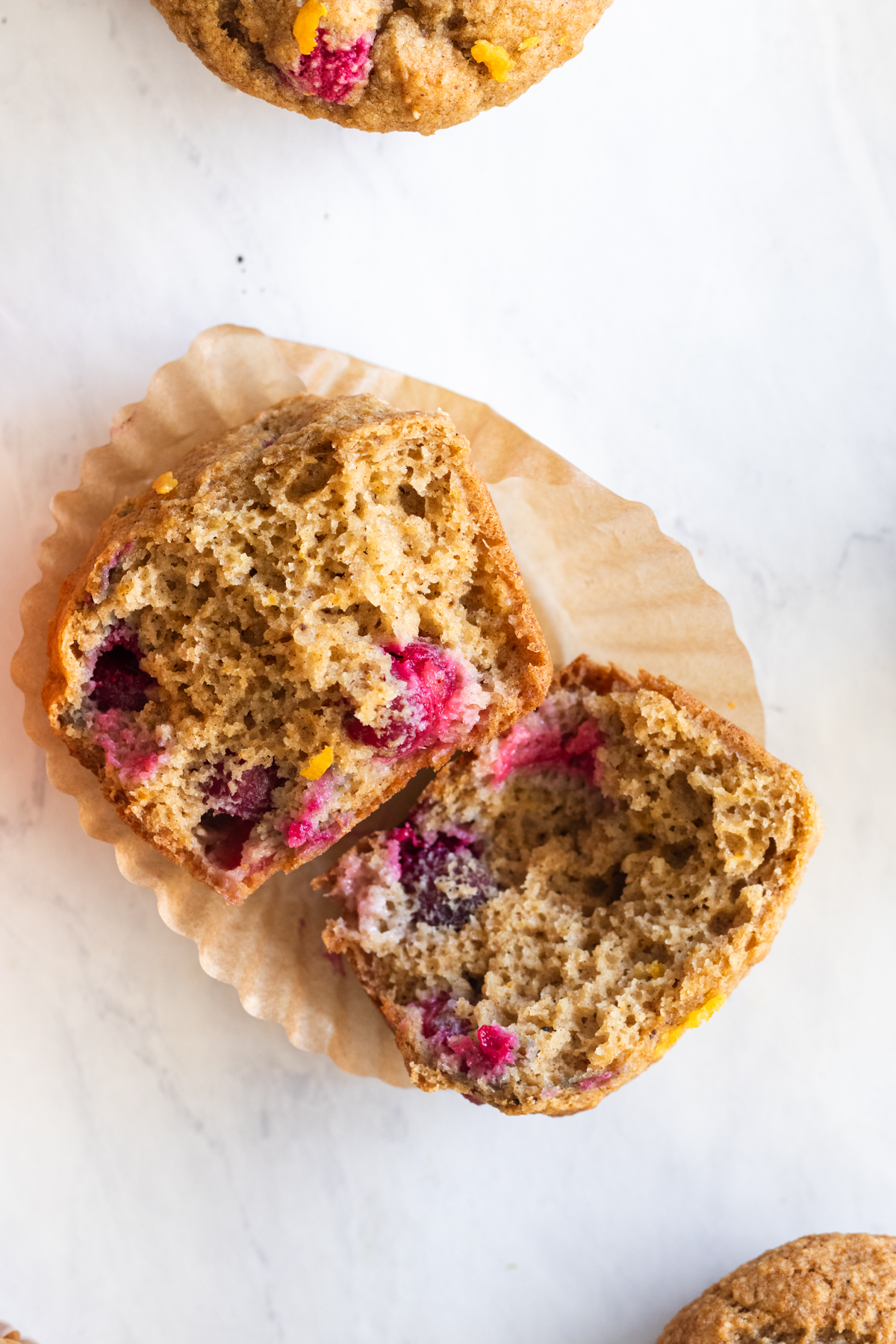 Gluten free Cranberry Orange Muffin cut in half.